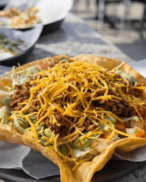 Taco salad in a crunchy tortilla shell